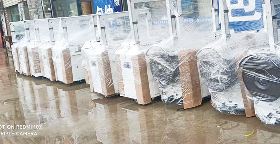 통은 플라스틱 PP 스트랩을 위한 350W 세미 오토매틱 스트래핑기 60KG 긴장 반자동 스트래핑기를 권투합니다